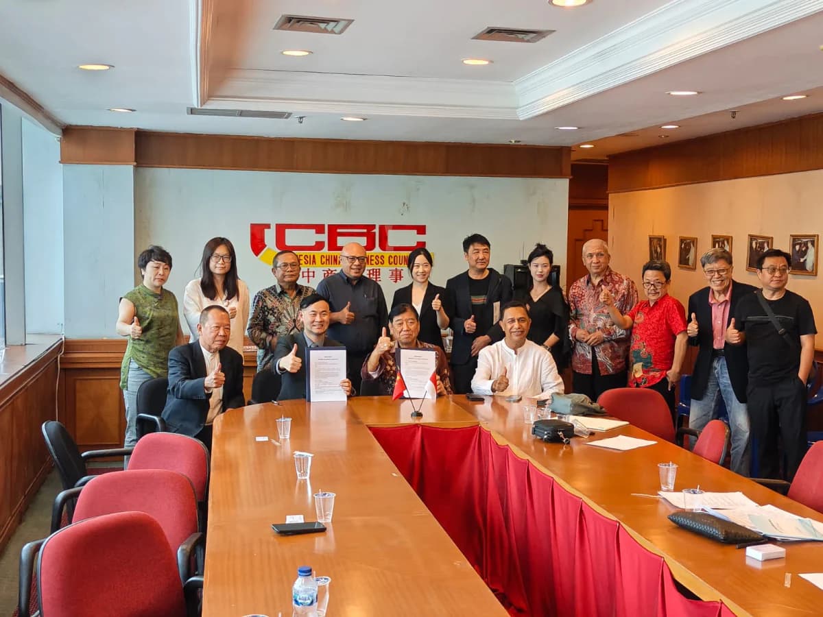 Signing activity and group photo at ICBC office